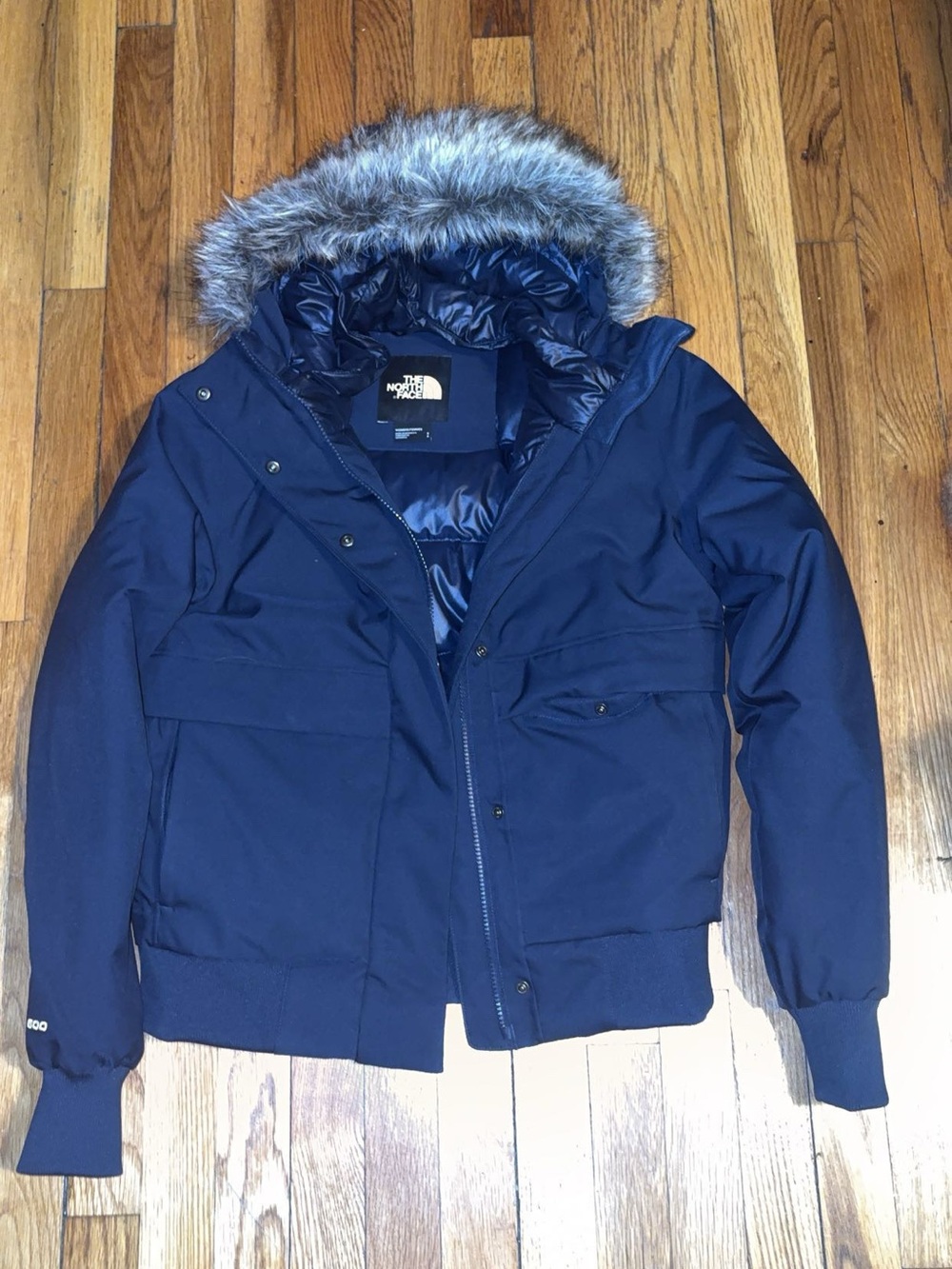 The North Face women’s Navy Puffer Jacket with Faux Fur Trim Hood